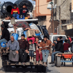 Palestinians flee Rafah as U.N. warns Israeli invasion could lead to a slaughter