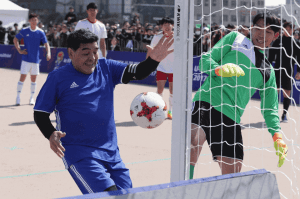 Maradona recreates ”hand of God” moment in South Korea