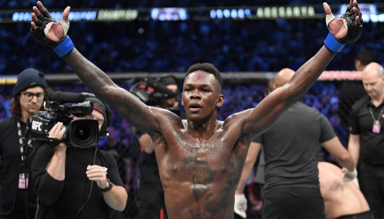 Israel Adesanya defeats Robert Whittaker to become undisputed UFC 243 middleweight champion