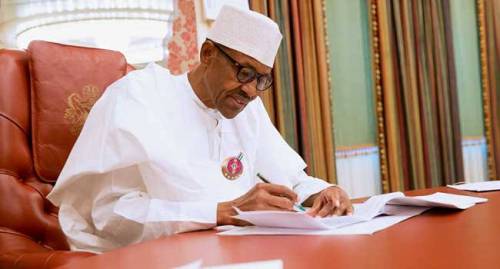 President Buhari Succumbs To Public Pressure, Signs COVID-19 ...