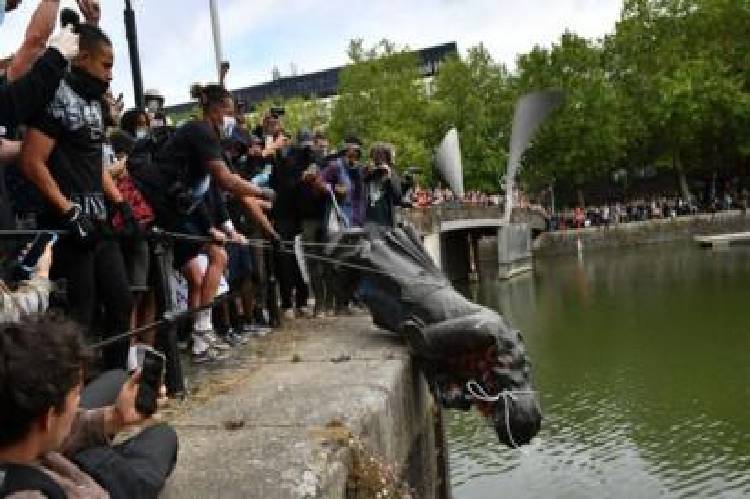 Toppled statue of slave trader Colston retrieved from Bristol Harbour