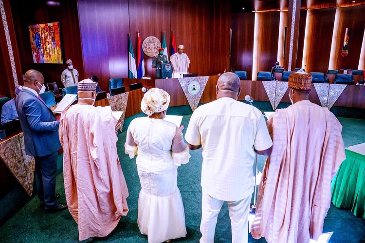 PHOTOS: Buhari swears in FCC, FCSC, RMAFC Commissioners