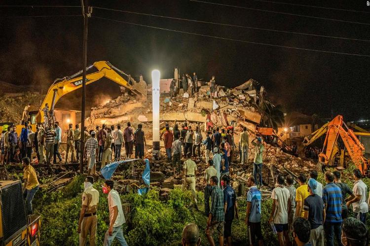 Ten killed, Many Trapped In India Building Collapse