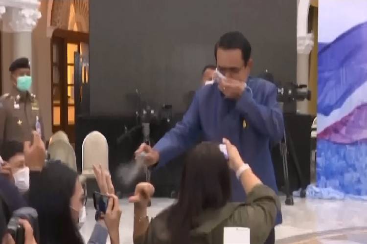 Thai PM Prayuth Chan-ocha ends presser, sprays reporters with disinfectant