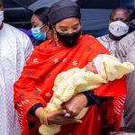 Aisha Buhari unveils First Baby of the year, charges mothers on care for babies
