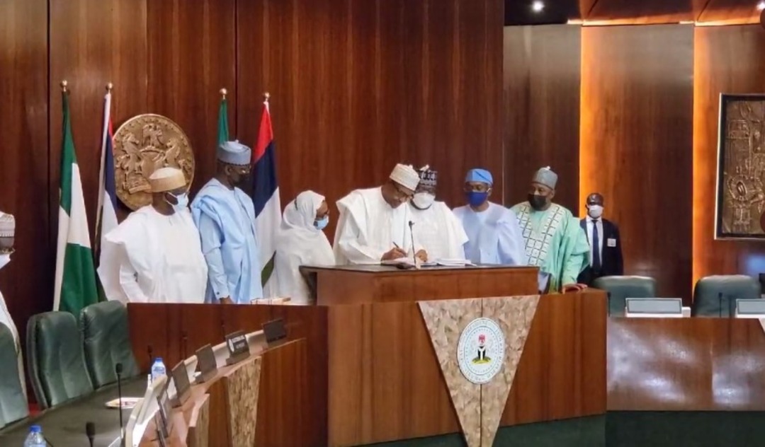 BREAKING: Buhari finally signs Electoral Act Amendment bill into law