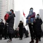 Shanghai allows 4million people out of homes as rules ease