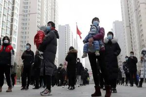 Shanghai allows 4million people out of homes as rules ease
