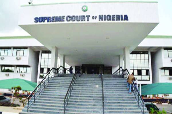 Supreme Court strikes out Buhari, Malami’s suit against Electoral Act