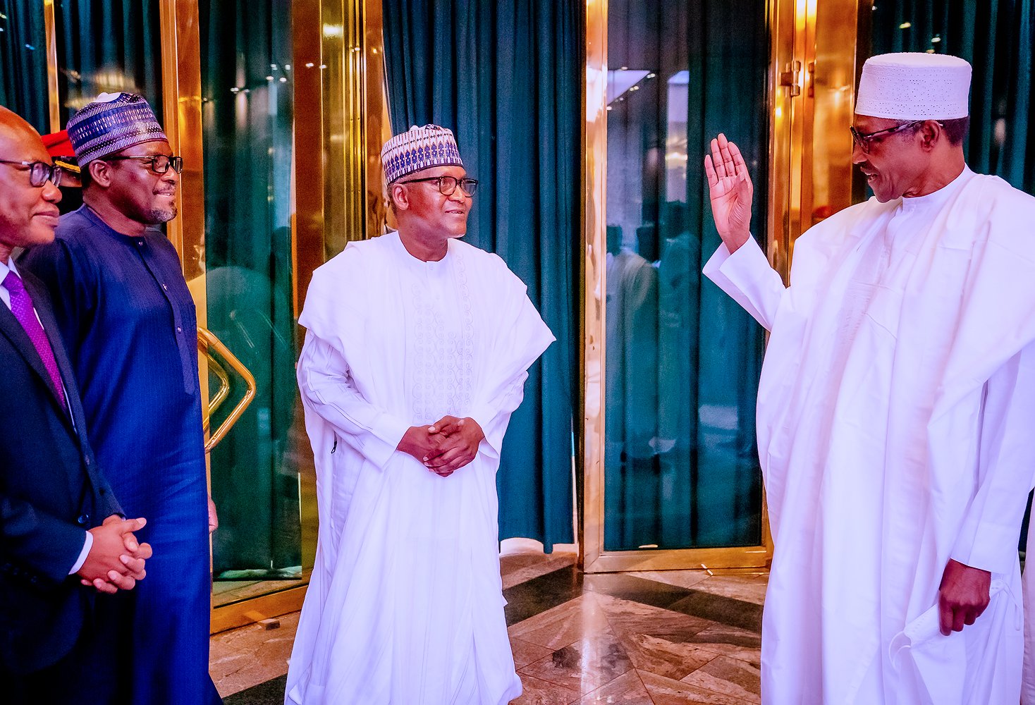 We’re tackling challenges undermining business, investments, Buhari tells Dangote group