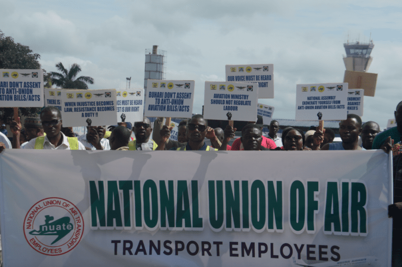Aviation workers protest, threaten nationwide strike