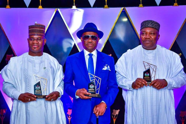 Buhari presents service awards to Wike, Jonathan, Others
