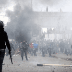 Tunisan police clash with protesters over migrants missing for 2 months