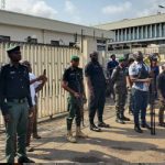 PROTESTERS BLOCK THE ENTRANCE OF CBN IN BENIN CITY