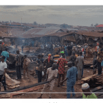 TRADERS COUNT LOSSES AFTERMATH PLANK MARKET FIRE