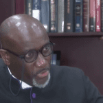 Clergyman calls for Peace, condemns call for interim govt