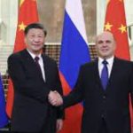 CHINA, RUSSIA SIGN DEALS. DEFIES WEST