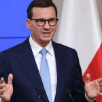 Poland PM Morawiecki says country will uphold Veto on EU migration pact