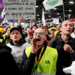 Angry French farmers storm into agriculture exhibition in Paris